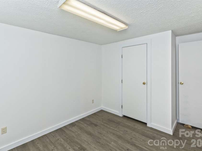 13 Cattail Drive, Sylva, NC 28779.  MLS# CAR4423552, YatesRealty ID 51604. Bedroom two, rooms are nicely sized!