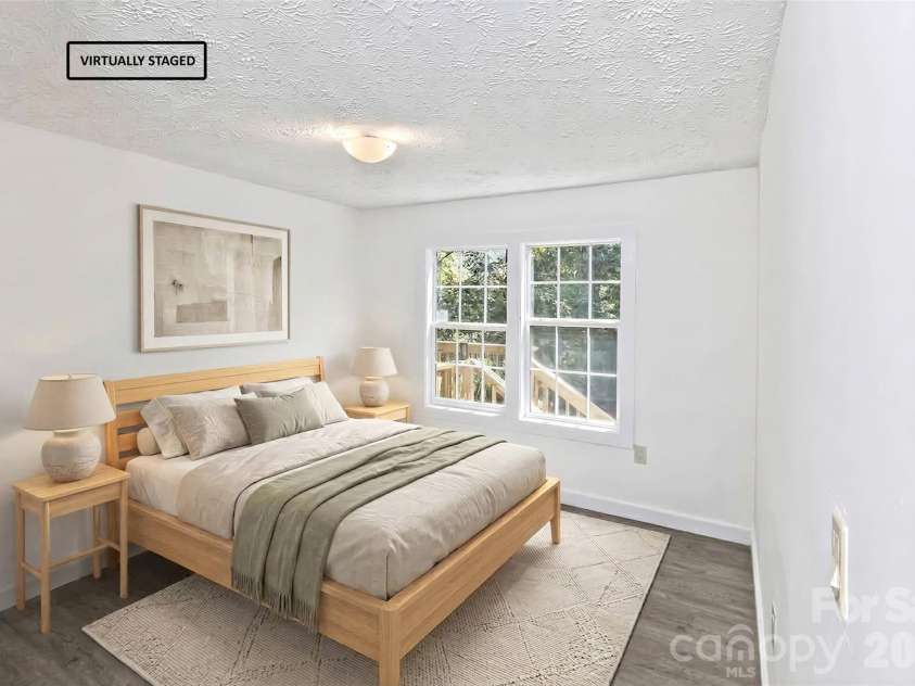 13 Cattail Drive, Sylva, NC 28779.  MLS# CAR4423552, YatesRealty ID 51604. Bedroom two, virtually staged