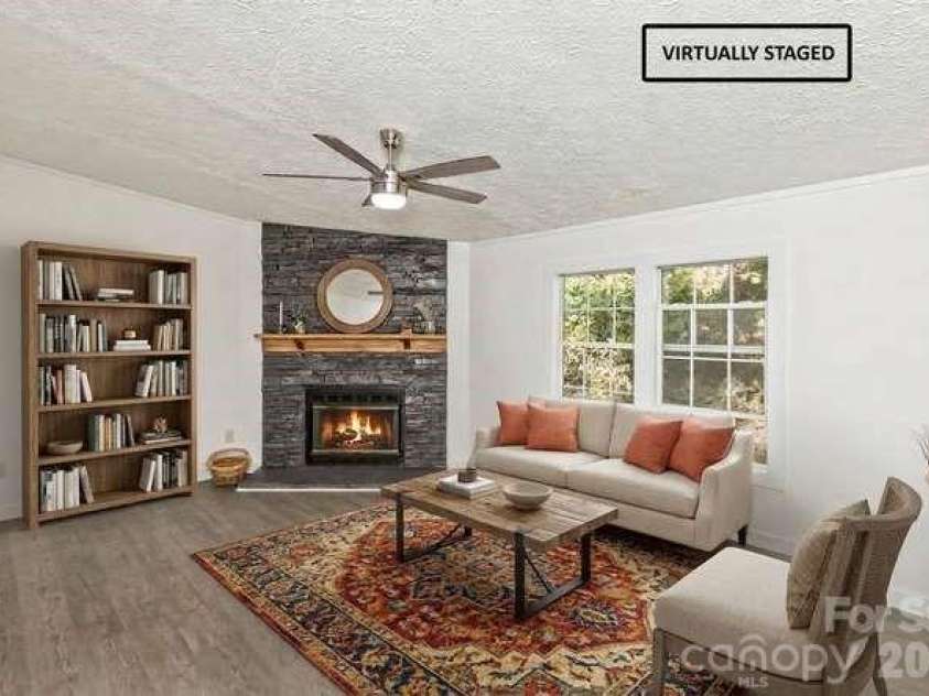 13 Cattail Drive, Sylva, NC 28779.  MLS# CAR4423552, YatesRealty ID 51604. Family Room, virtually staged...