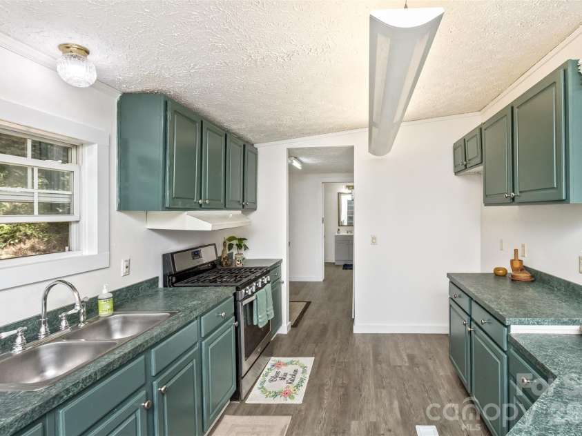 13 Cattail Drive, Sylva, NC 28779.  MLS# CAR4423552, YatesRealty ID 51604. Plenty of storage space