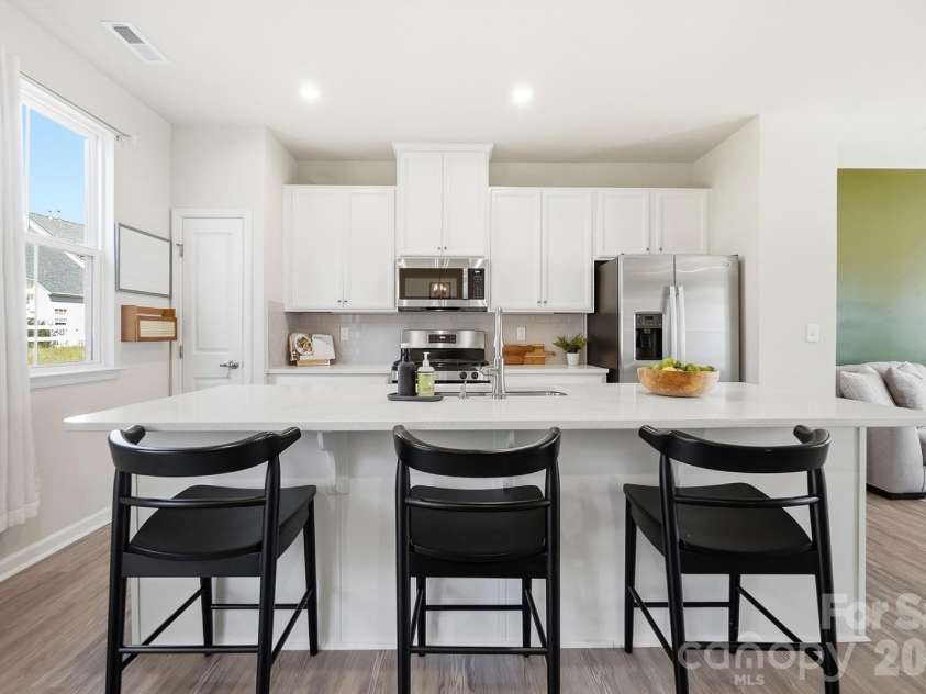 2606 Grantham Place Drive, Fort Mill, SC 29715.  MLS# CAR4423655, YatesRealty ID 51605. Island with quartz counters