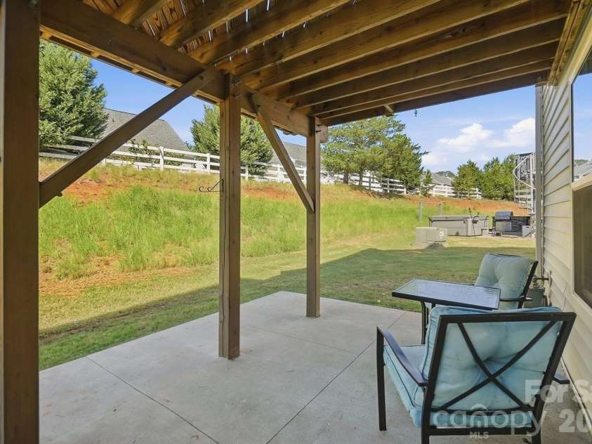 2606 Grantham Place Drive, Fort Mill, SC 29715.  MLS# CAR4423655, YatesRealty ID 51605. Patio down with full concrete