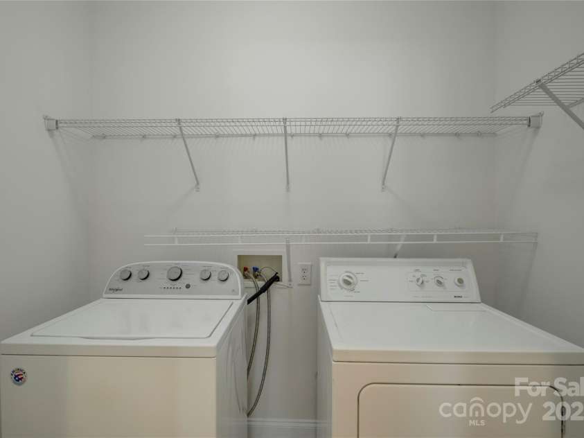 10029 Daufuskie Drive, Charlotte, NC 28278.  MLS# CAR4204538, YatesRealty ID 5161. Laundry on the main