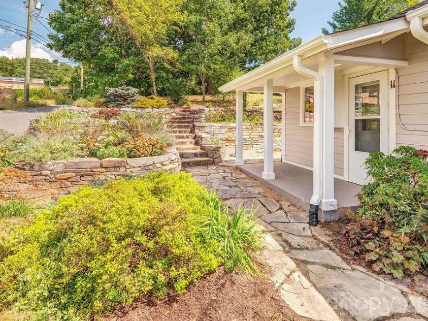 11 Temple Avenue, Asheville, NC 28804.  MLS# CAR4421842, YatesRealty ID 51613. Stonework, pathways, and mature gardens