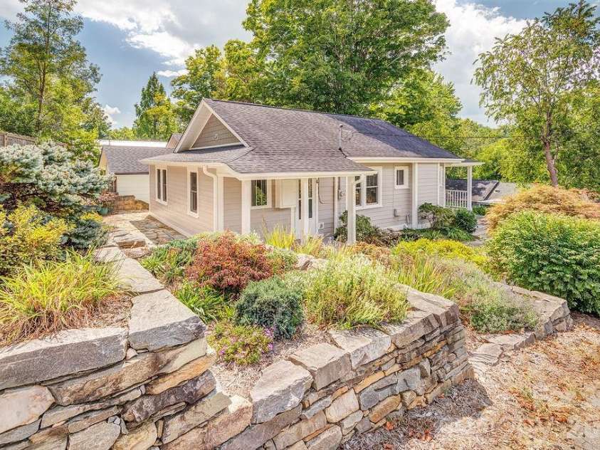 11 Temple Avenue, Asheville, NC 28804.  MLS# CAR4421842, YatesRealty ID 51613. Stonework, pathways, and mature gardens