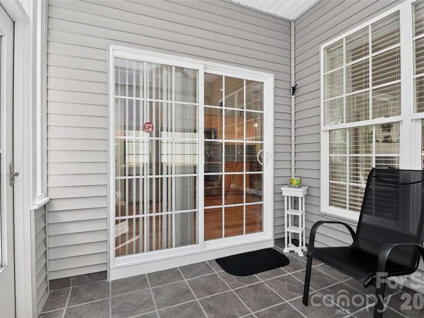 9247 Elrose Place, Charlotte, NC 28277.  MLS# CAR4424093, YatesRealty ID 51617. Enclosed Rear Porch