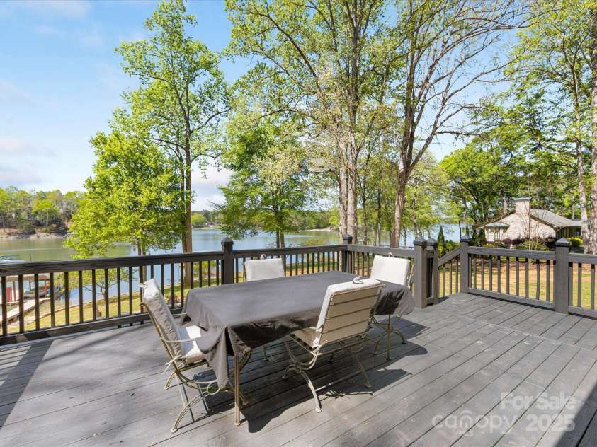 1395 Roundstone Road, Sherrills Ford, NC 28673.  MLS# CAR4243971, YatesRealty ID 5162. Gorgeous views of the large cove from the back deck!