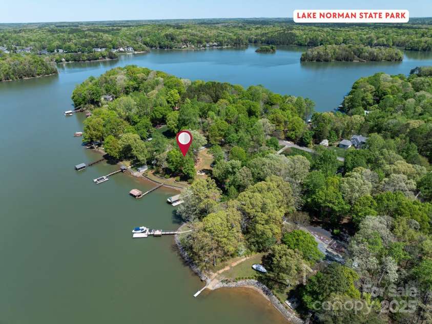 1395 Roundstone Road, Sherrills Ford, NC 28673.  MLS# CAR4243971, YatesRealty ID 5162. Home located near main channel and a short boat ride to Lake Norman State Park.