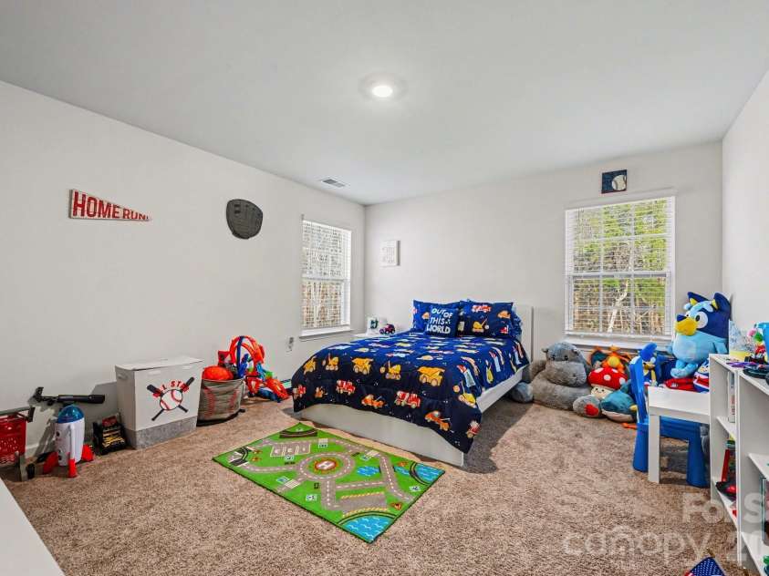 664 Saddlebred Lane, Locust, NC 28097.  MLS# CAR4360110, YatesRealty ID 5162. 1 of 4 secondary bedrooms