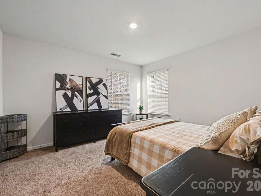 664 Saddlebred Lane, Locust, NC 28097.  MLS# CAR4360110, YatesRealty ID 5162. Secondary bedroom