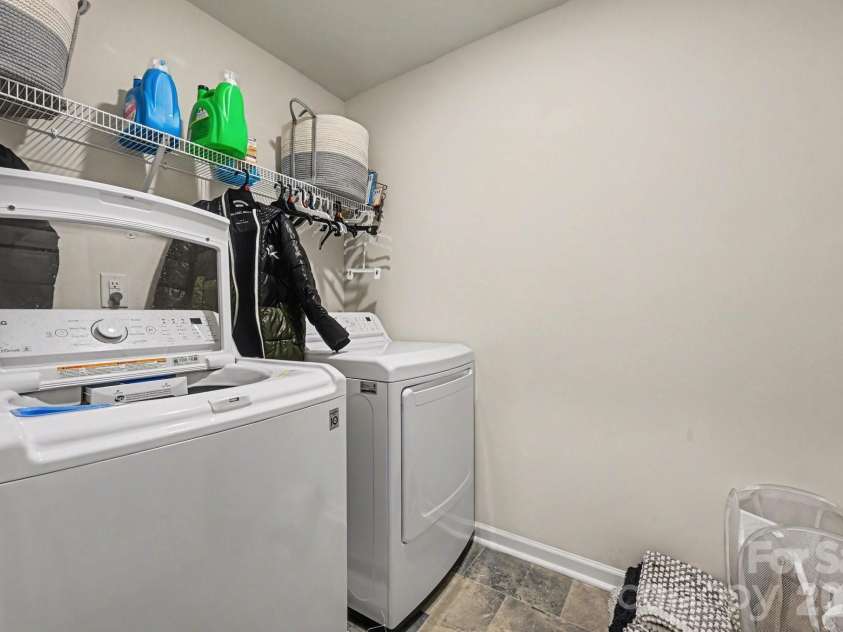 664 Saddlebred Lane, Locust, NC 28097.  MLS# CAR4360110, YatesRealty ID 5162. Upper level laundry room