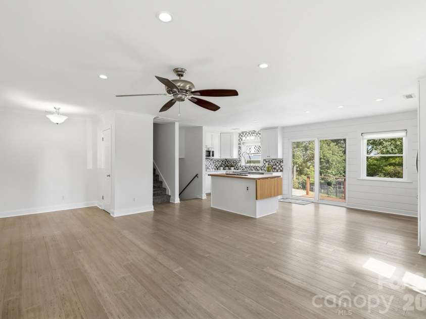 3022 Point Clear Drive, Tega Cay, SC 29708.  MLS# CAR4423199, YatesRealty ID 51620. Beautiful LVP flooring throughout the main level adds a sophisticated, modern touch while offering the durability and easy maintenance today's buyers love.