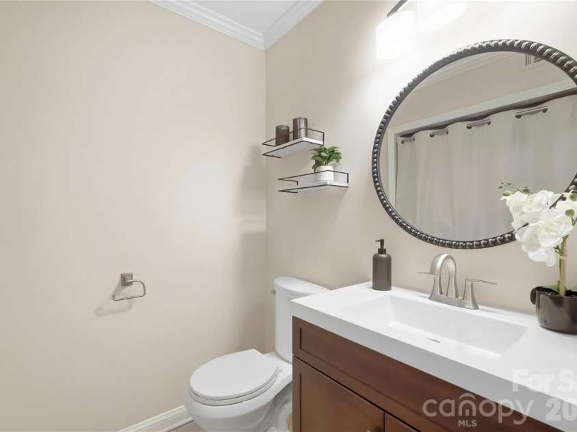 6816 Dumbarton Drive, Charlotte, NC 28210.  MLS# CAR4423174, YatesRealty ID 51621. Half Bath and Laundry Space