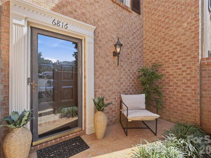6816 Dumbarton Drive, Charlotte, NC 28210.  MLS# CAR4423174, YatesRealty ID 51621. Private front porch
