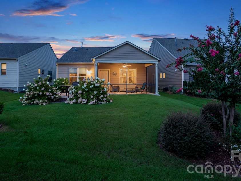 1018 Kirby Drive, Fort Mill, SC 29715.  MLS# CAR4411917, YatesRealty ID 51638. Twilight view of Back Yard