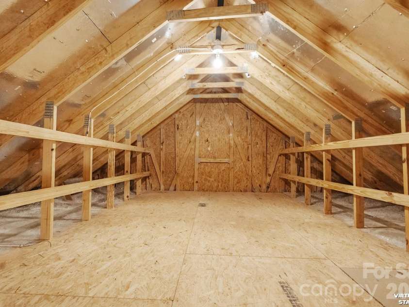 1018 Kirby Drive, Fort Mill, SC 29715.  MLS# CAR4411917, YatesRealty ID 51638. Walk-up Attic Storage.  Accessible from the Garage.