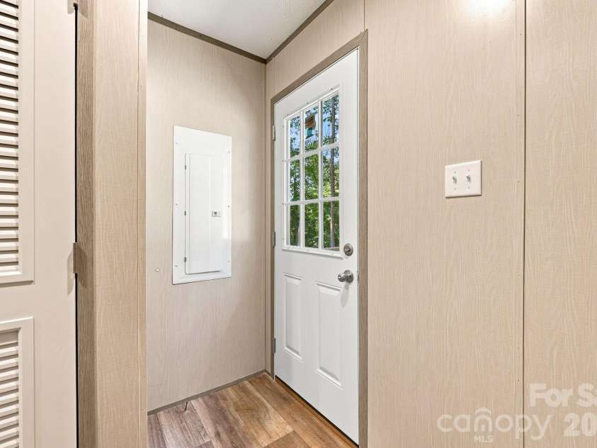 93 Foxcroft Lane, Flat Rock, NC 28792.  MLS# CAR4414955, YatesRealty ID 51640. Back Entry to Laundry Room