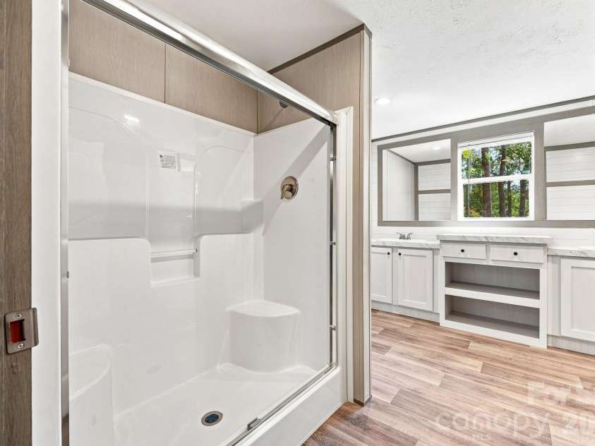 93 Foxcroft Lane, Flat Rock, NC 28792.  MLS# CAR4414955, YatesRealty ID 51640. Primary Bathroom