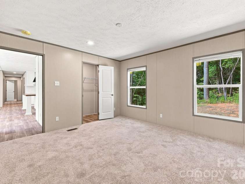 93 Foxcroft Lane, Flat Rock, NC 28792.  MLS# CAR4414955, YatesRealty ID 51640. Primary Bedroom