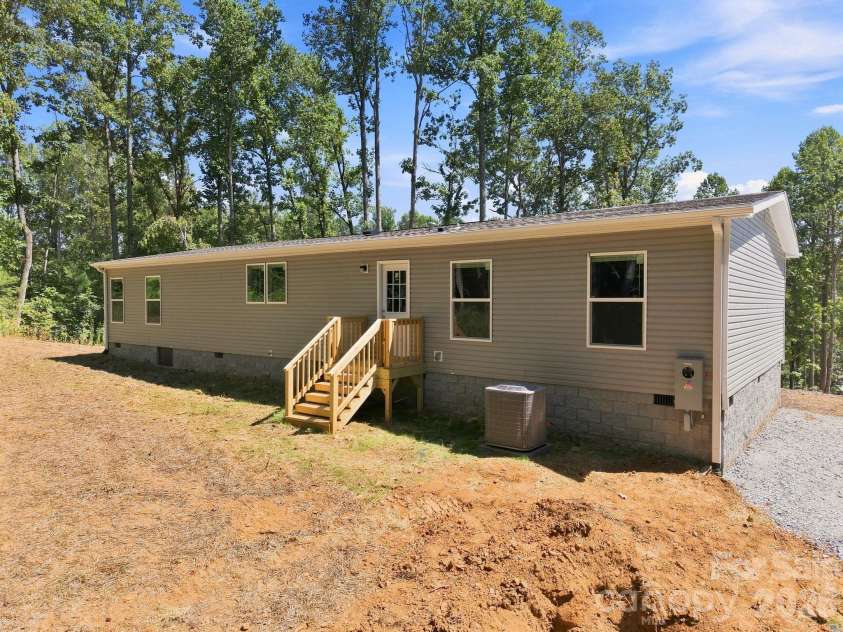93 Foxcroft Lane, Flat Rock, NC 28792.  MLS# CAR4414955, YatesRealty ID 51640. Rear View