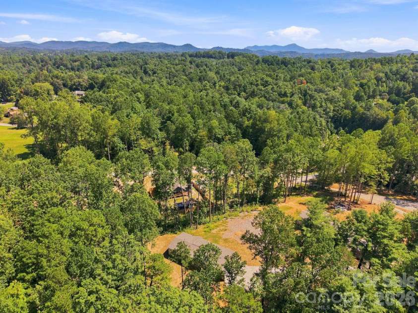 93 Foxcroft Lane, Flat Rock, NC 28792.  MLS# CAR4414955, YatesRealty ID 51640. Top of the Hill Drone View