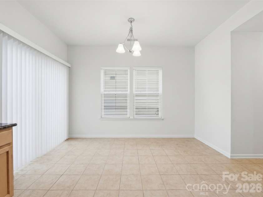 3341 Linetender Drive, Davidson, NC 28036.  MLS# CAR4425656, YatesRealty ID 51645. Breakfast Nook: Bright breakfast area with backyard views and room for casual dining and direct access to the backyard patio.