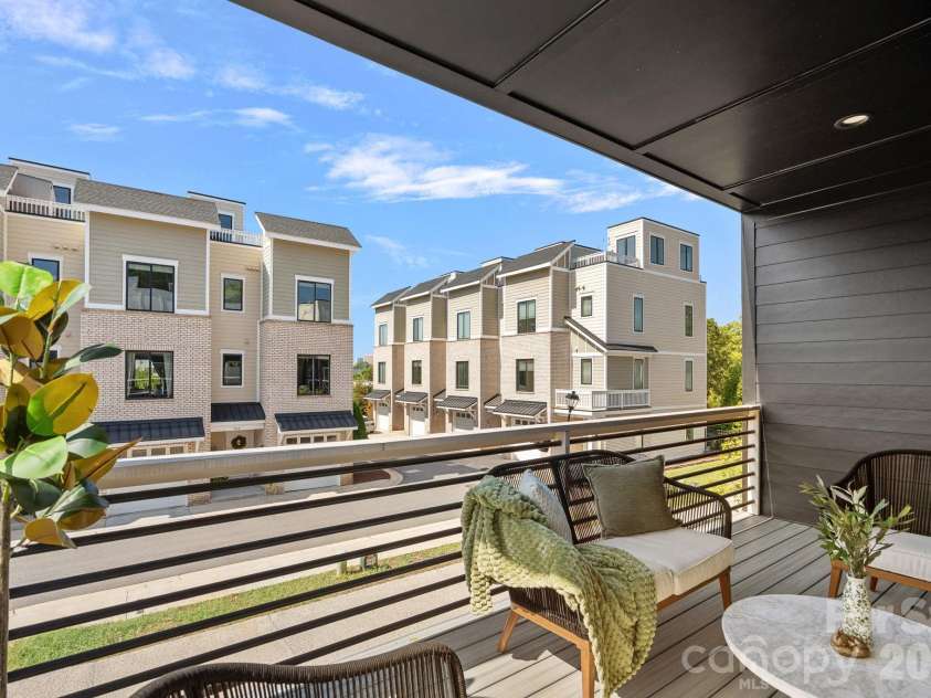 910 Van Every Street, Charlotte, NC 28205.  MLS# CAR4424577, YatesRealty ID 51651. Covered balcony off kitchen/dining area