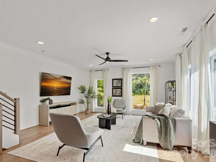 910 Van Every Street, Charlotte, NC 28205.  MLS# CAR4424577, YatesRealty ID 51651. Living Area w/ expansive windows