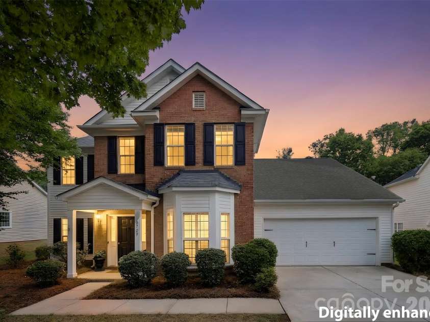 8709 Ellington Park Drive, Charlotte, NC 28277.  MLS# CAR4425738, YatesRealty ID 51656. Front view at sunset
