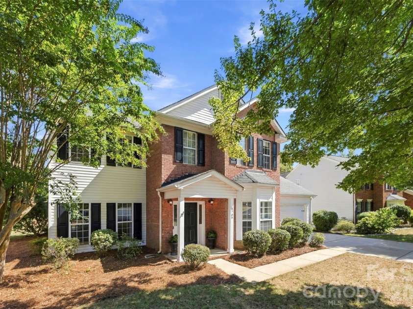 8709 Ellington Park Drive, Charlotte, NC 28277.  MLS# CAR4425738, YatesRealty ID 51656. Front view with mature landscaping