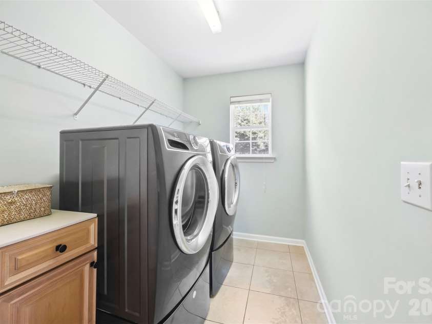 8709 Ellington Park Drive, Charlotte, NC 28277.  MLS# CAR4425738, YatesRealty ID 51656. Laundry Room