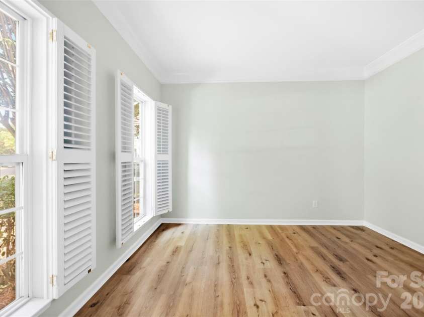 8709 Ellington Park Drive, Charlotte, NC 28277.  MLS# CAR4425738, YatesRealty ID 51656. Study with plantation shutters