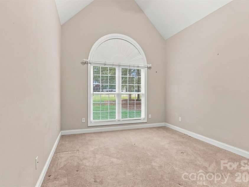 1524 Garrett Landen Drive, Clover, SC 29710.  MLS# CAR4418326, YatesRealty ID 51658. 2nd bedroom on the main floor with vaulted ceiling and ceiling fan
