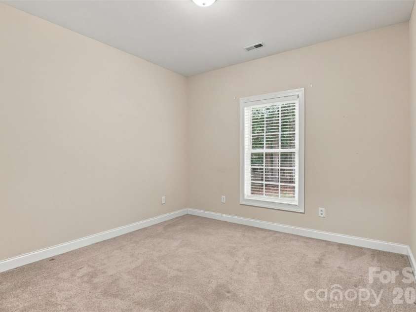 1524 Garrett Landen Drive, Clover, SC 29710.  MLS# CAR4418326, YatesRealty ID 51658. 3rd bedroom on main floor, window facing the fenced in backyard!