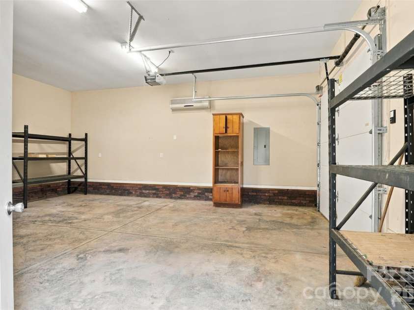 1524 Garrett Landen Drive, Clover, SC 29710.  MLS# CAR4418326, YatesRealty ID 51658. Amazing space for a workshop or storage, or both!  Side door allows access without opening garage door.