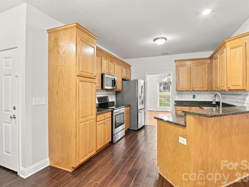 1524 Garrett Landen Drive, Clover, SC 29710.  MLS# CAR4418326, YatesRealty ID 51658. Open concept kitchen looking into the formal dining room!