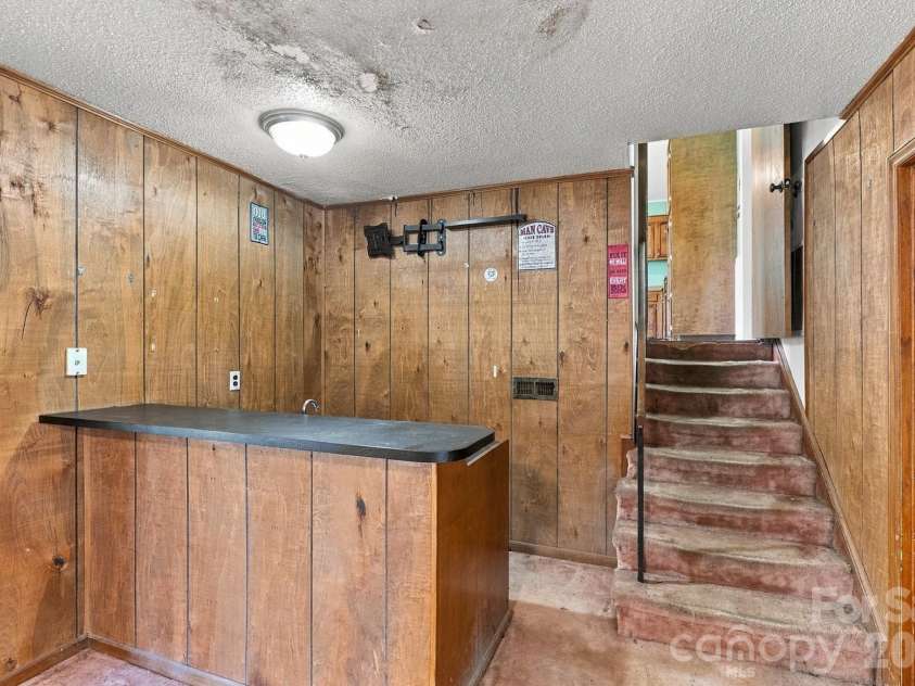 2116 Deepwood Court, Gastonia, NC 28054.  MLS# CAR4416884, YatesRealty ID 51664. Lower area with bar