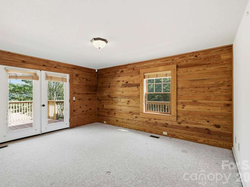 134 Raleigh Drive, Lake Lure, NC 28746.  MLS# CAR4423634, YatesRealty ID 51670. Guest bedroom 2 main level, has the view.