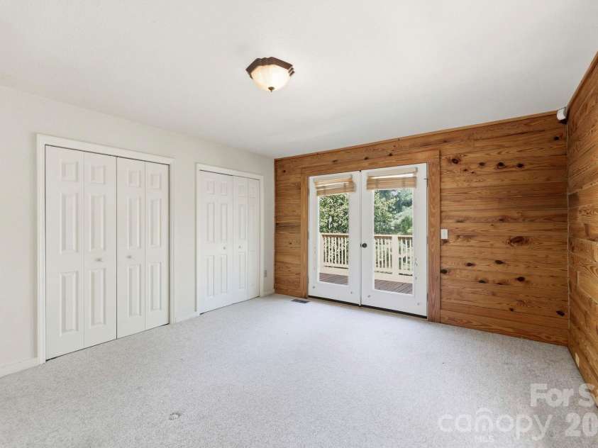 134 Raleigh Drive, Lake Lure, NC 28746.  MLS# CAR4423634, YatesRealty ID 51670. Guest bedroom 2 main level, has the view.
