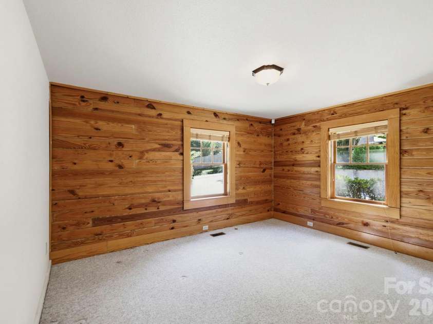 134 Raleigh Drive, Lake Lure, NC 28746.  MLS# CAR4423634, YatesRealty ID 51670. Guest room 1 main level.