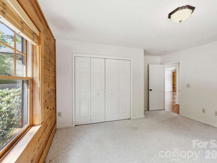 134 Raleigh Drive, Lake Lure, NC 28746.  MLS# CAR4423634, YatesRealty ID 51670. Guest room 1 main level.