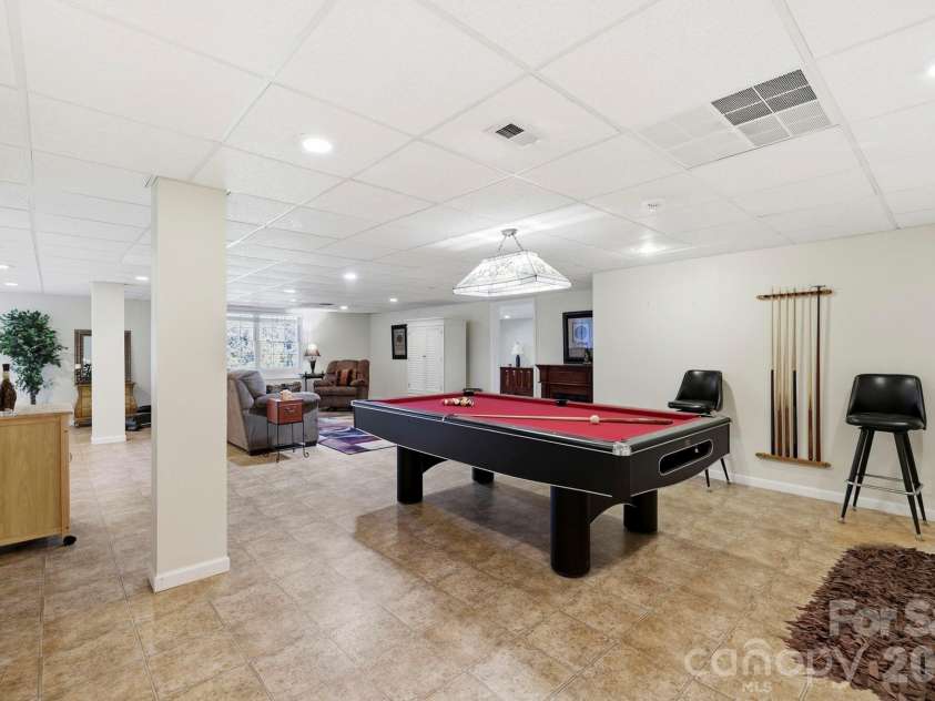 134 Raleigh Drive, Lake Lure, NC 28746.  MLS# CAR4423634, YatesRealty ID 51670. Walking into the finished basement.