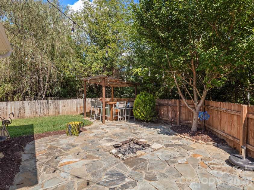 16 Stonebury Drive, Arden, NC 28704.  MLS# CAR4425932, YatesRealty ID 51681. Backyard