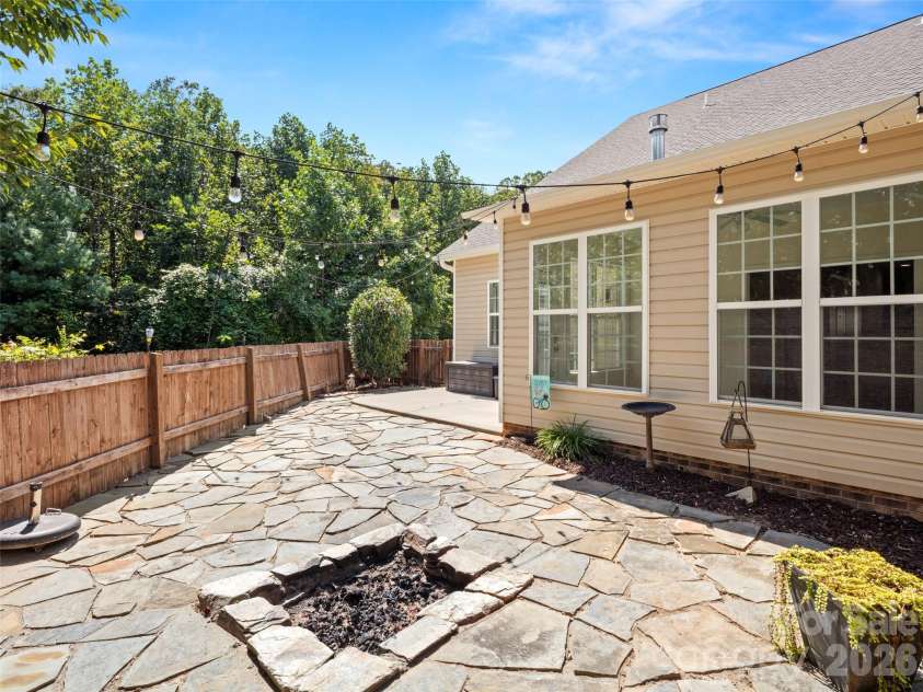 16 Stonebury Drive, Arden, NC 28704.  MLS# CAR4425932, YatesRealty ID 51681. Backyard