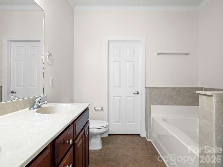 16 Stonebury Drive, Arden, NC 28704.  MLS# CAR4425932, YatesRealty ID 51681. Primary Bath