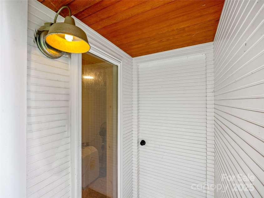 74 & 76 Park Drive, Waynesville, NC 28786.  MLS# CAR4201316, YatesRealty ID 5169. Separate Entrance to Storage Area