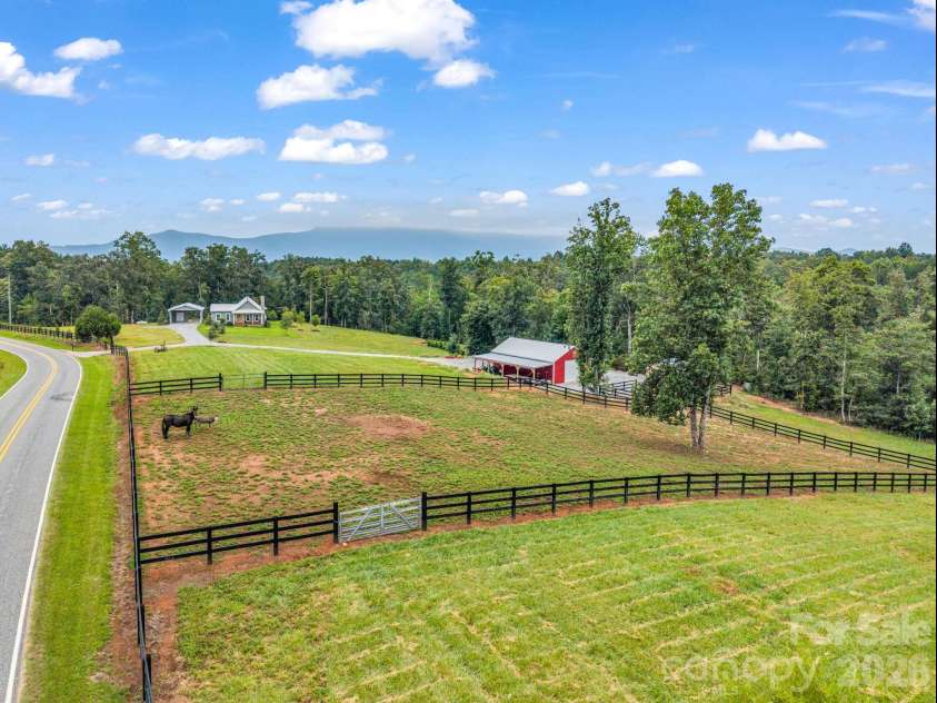 2255 Lake Adger Road, Mill Spring, NC 28756.  MLS# CAR4426062, YatesRealty ID 51693. Fenced pasture
