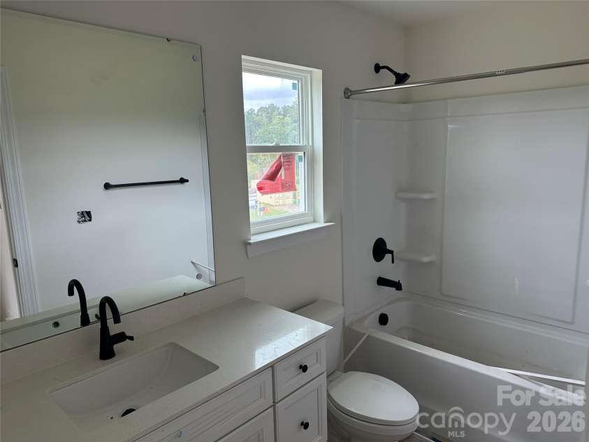 2211 Tabor Road, Sherrills Ford, NC 28673.  MLS# CAR4418148, YatesRealty ID 51711. Upper Bathroom