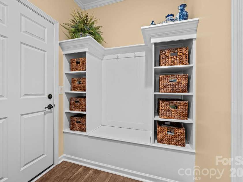 411 Haven Avenue, Fort Mill, SC 29715.  MLS# CAR4425938, YatesRealty ID 51714. Drop zone with bench that opens for more storage
