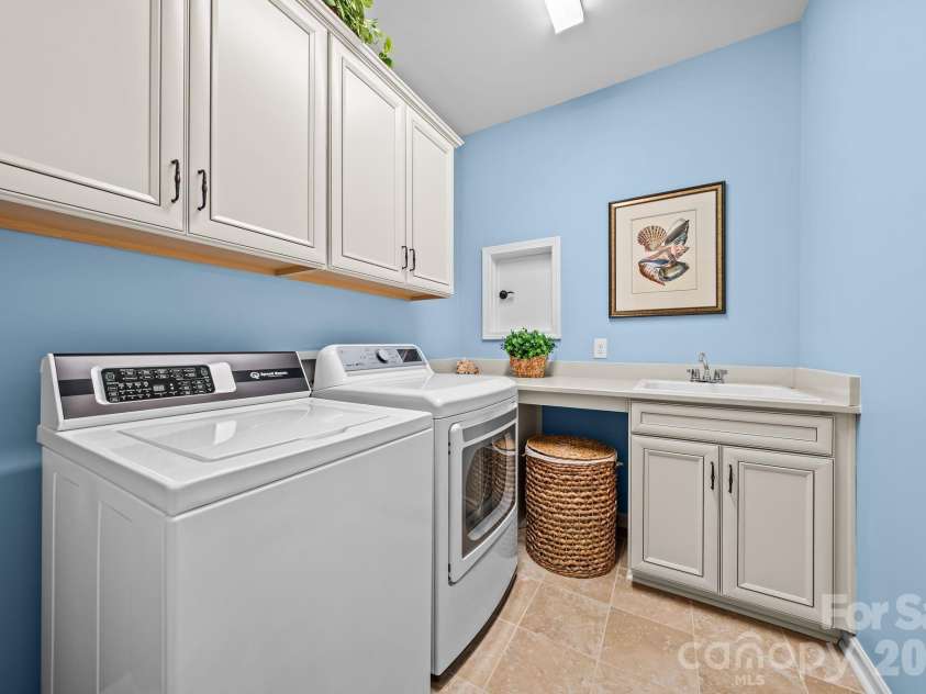 411 Haven Avenue, Fort Mill, SC 29715.  MLS# CAR4425938, YatesRealty ID 51714. Laundry room with sink and counter space for folding and ironing